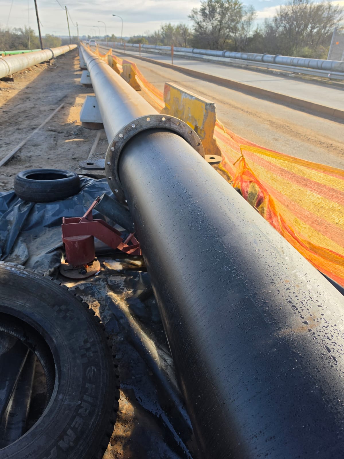 Installed HDPE pipeline on a bridge crossing with flanged joints